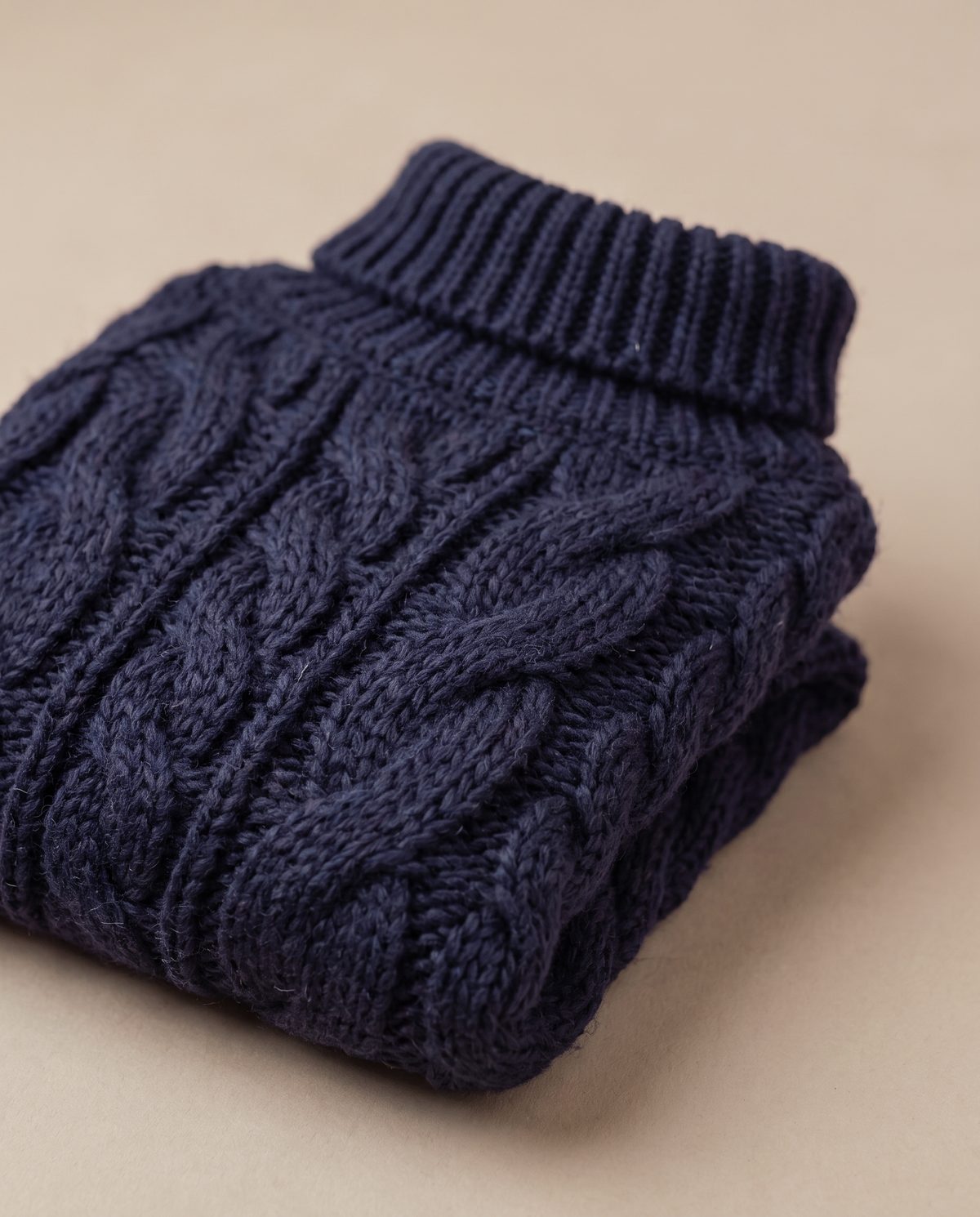 The Knit folded, showing the cable pattern